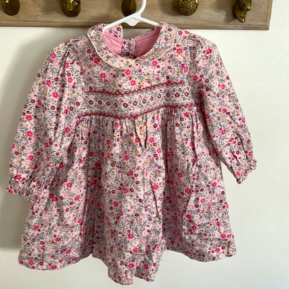 Pink smocked dress with modesty shorts. 12-18 months.